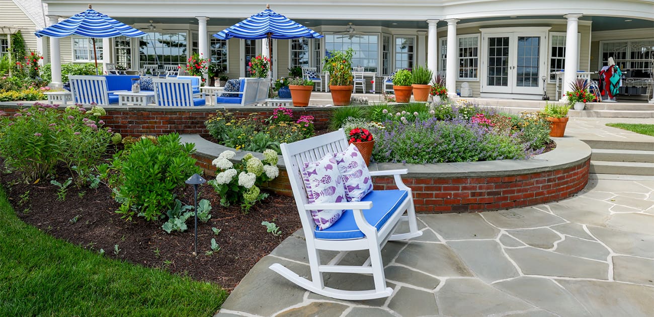 CMS Landscape A Waterfront Estate Rooted in Legacy, Refined for Today, a new project feature from CMS Landscape. This property includes a stunning backyard that lines the waterfront with a beautiful patio and swimming pool and lots of flowers and shrubs.