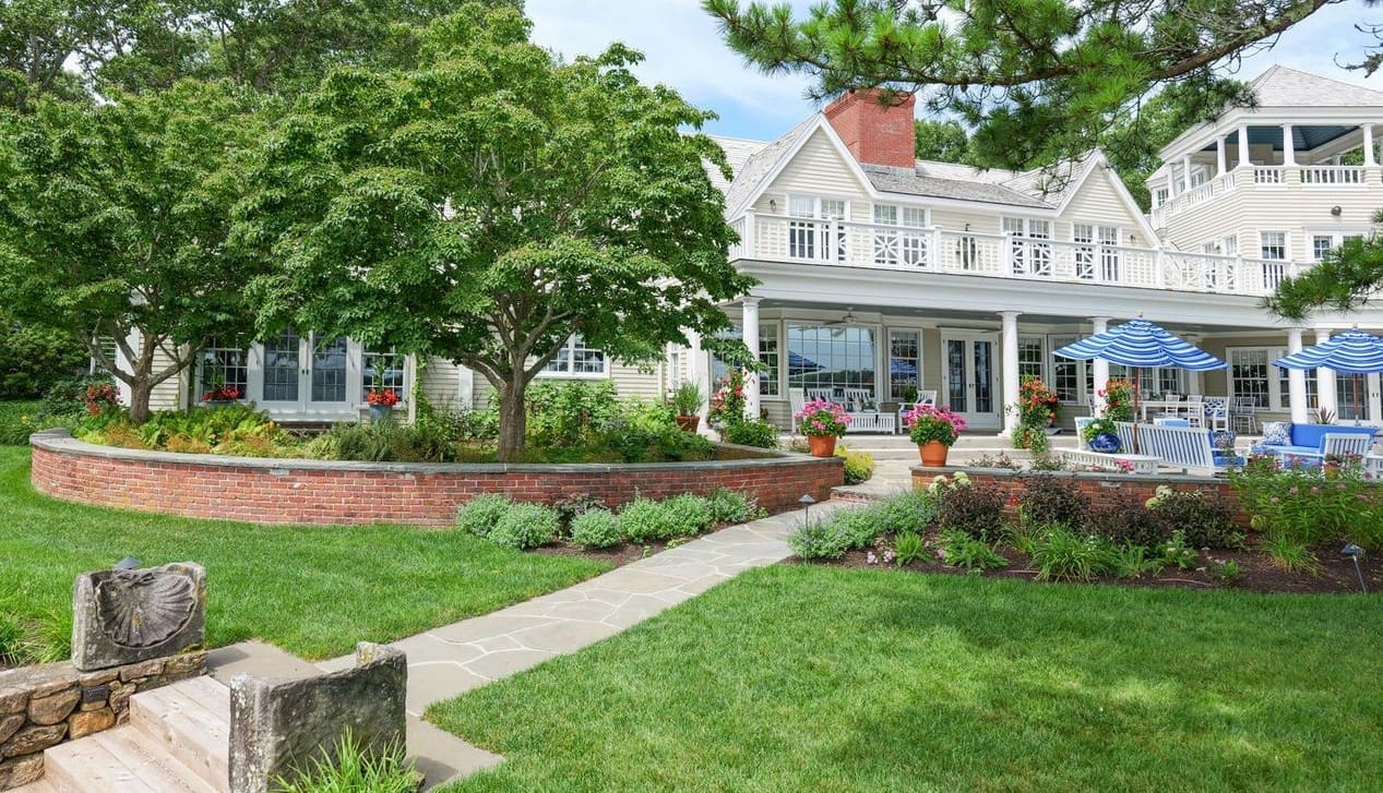 A beautiful waterfront property landscape managed by CMS Landscape