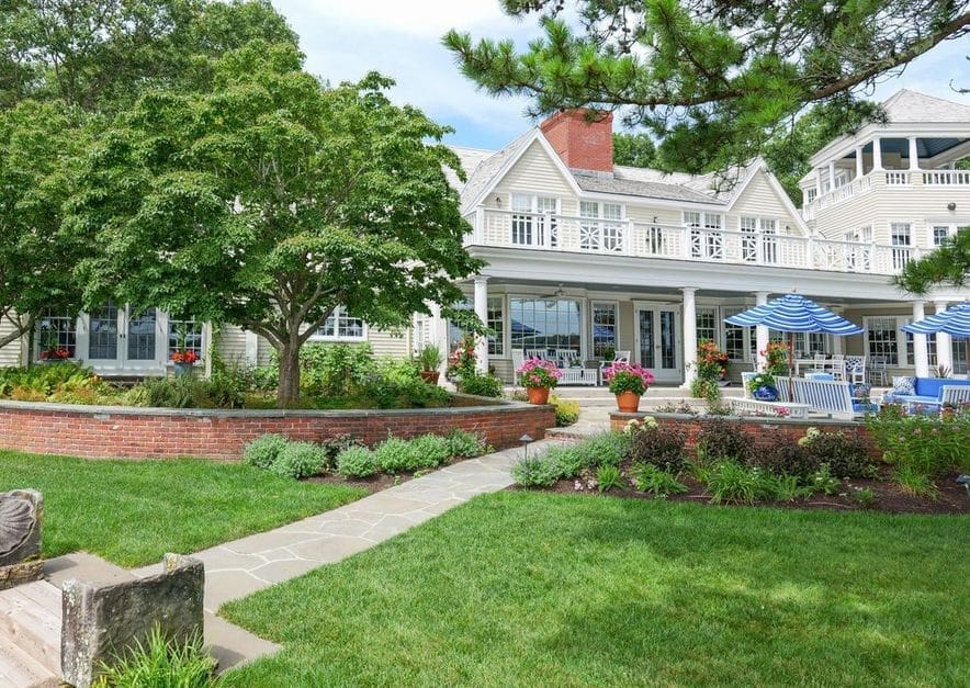 A beautiful waterfront property landscape managed by CMS Landscape