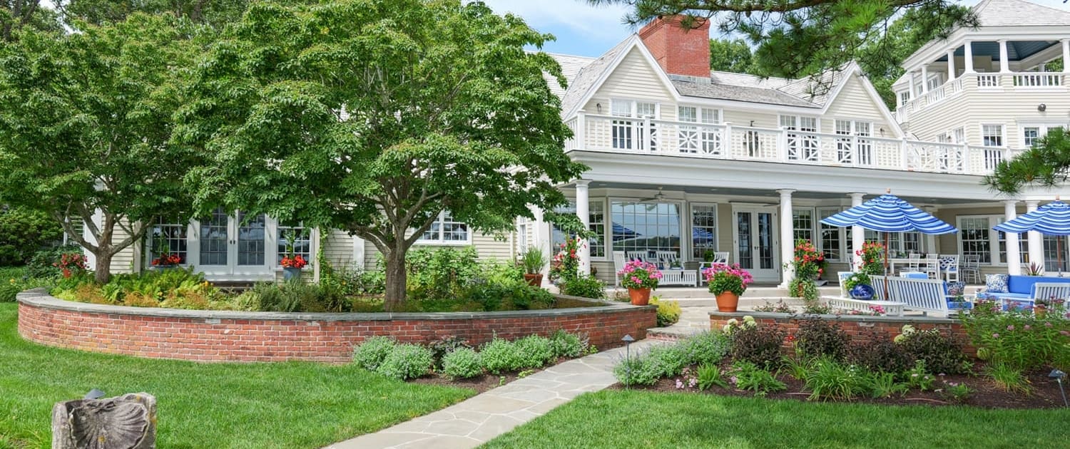 A beautiful waterfront property landscape managed by CMS Landscape