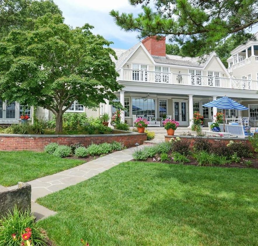 A beautiful waterfront property landscape managed by CMS Landscape